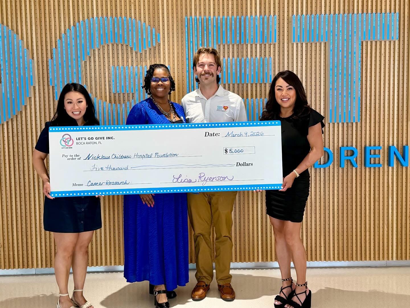 Let's Go Give donation presentation at Nicklaus Children's Hospital Foundation